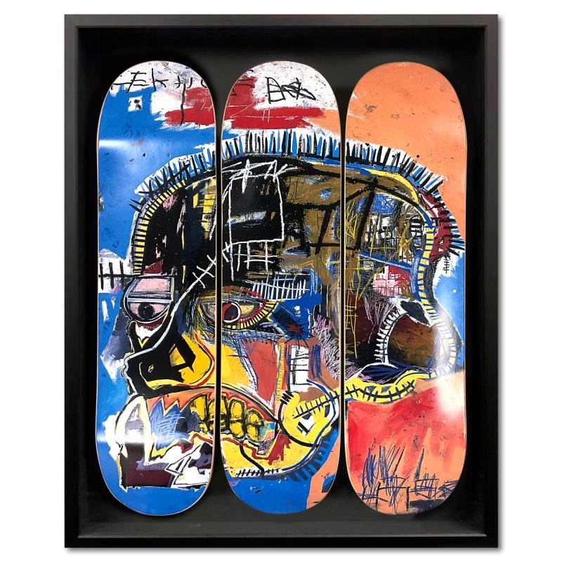 Basquiat (1960-1988) "Skull" Limited Edition Mixed Media on Board: "Skull" is a skateboard triptych by Jean-Michel Basquiat (1960-1988), bearing the plate signature of the artist inverso. This triptych comes custom framed. Includes Letter of Authenticity. Measures ap