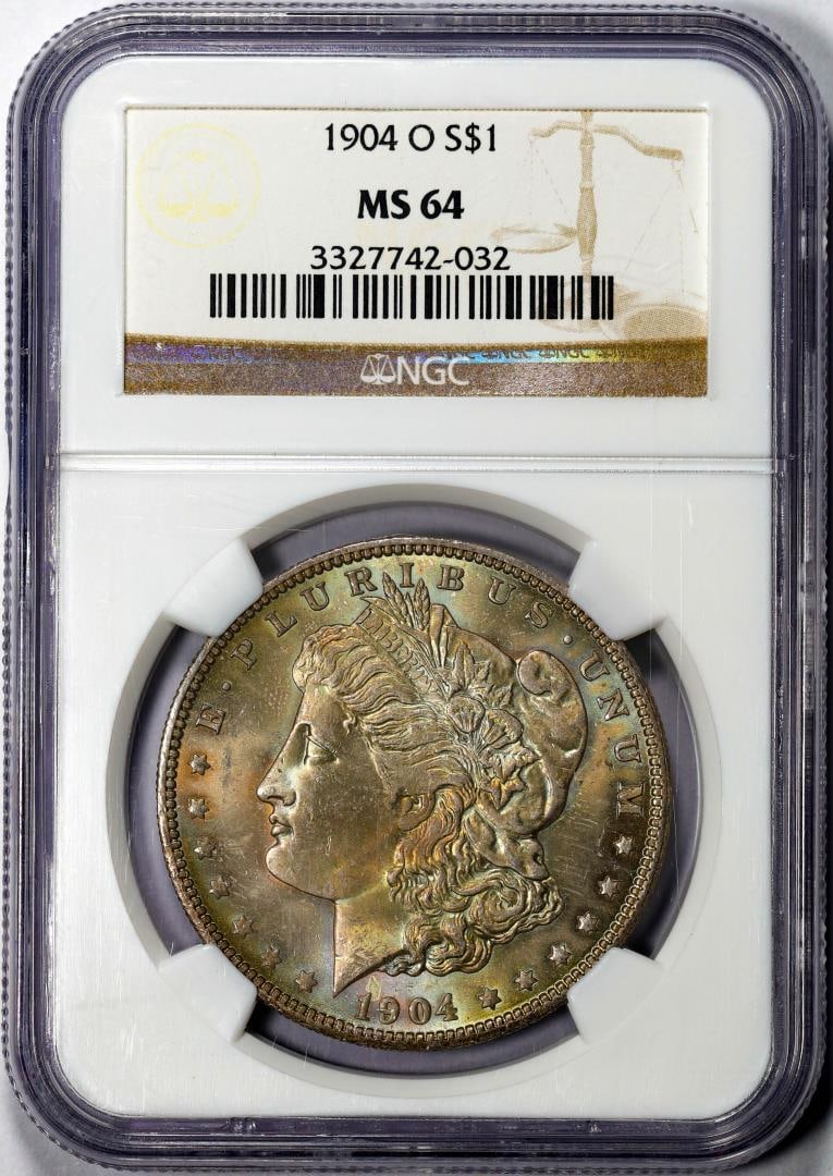 1904-O $1 Morgan Silver Dollar Coin NGC MS64 Great Toning: One 1904-O $1 Morgan Silver Dollar Coin NGC MS64 Great Toning. NGC Certified.