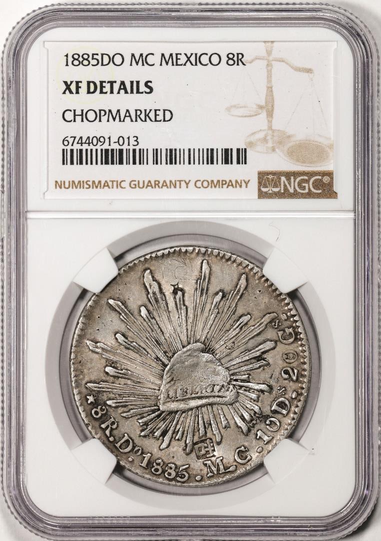 1885DO MC Mexico 8 Reales Silver Coin NGC XF Details Chopmarked: One 1885DO MC Mexico 8 Reales Silver Coin NGC XF Details Chopmarked. NGC Certified.