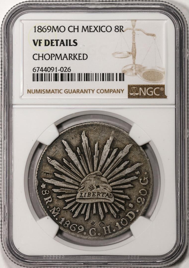 1869MO CH Mexico 8 Reales Silver Coin NGC VF Details Chopmarked: One 1869MO CH Mexico 8 Reales Silver Coin NGC VF Details Chopmarked. NGC Certified.