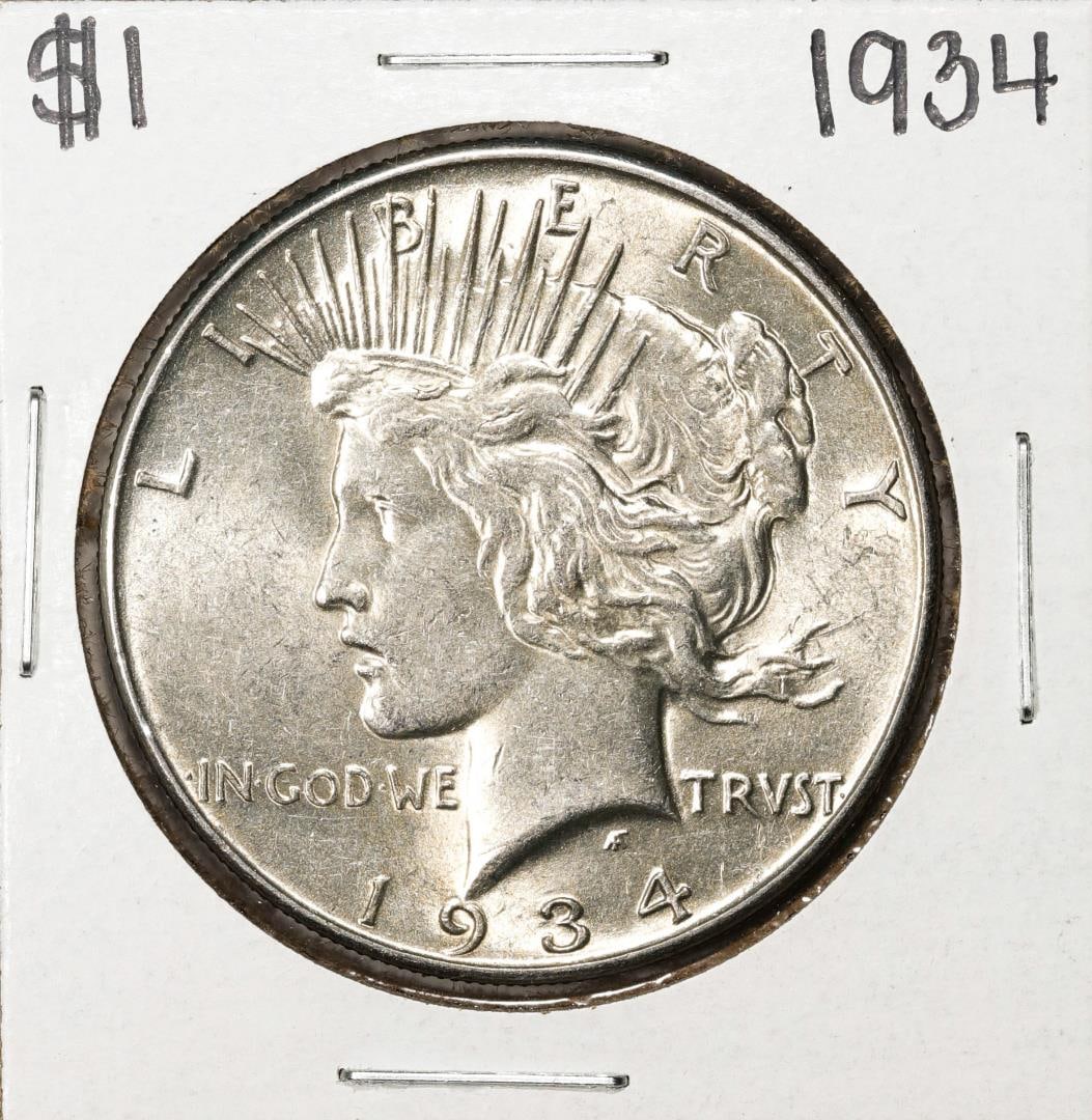 1934 $1 Peace Silver Dollar Coin: One 1934 $1 Peace Silver Dollar Coin .