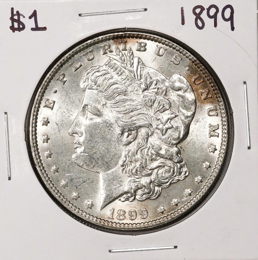 1899 $1 Morgan Silver Dollar Coin: One 1899 $1 Morgan Silver Dollar Coin.