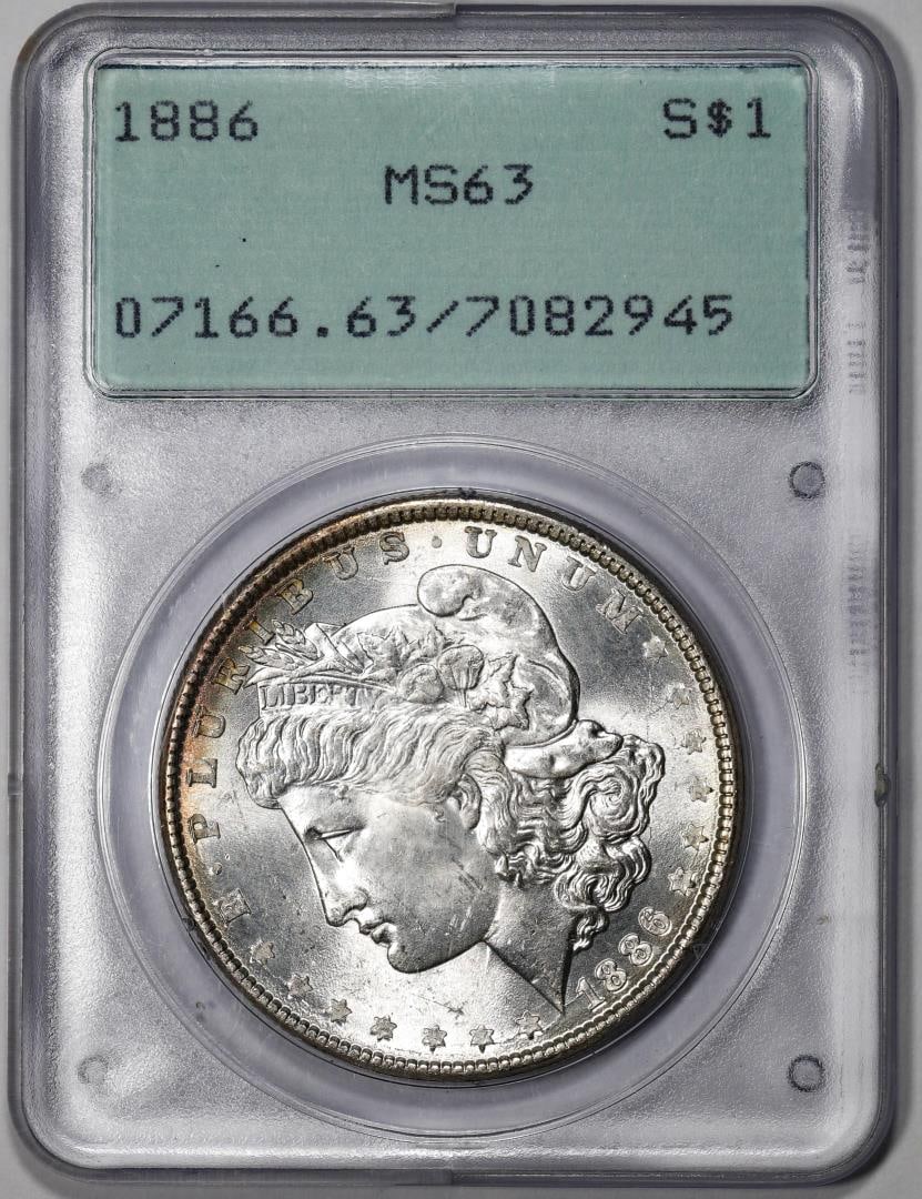 1886 $1 Morgan Silver Dollar Coin PCGS MS63 Old Green Rattler: One 1886 $1 Morgan Silver Dollar Coin PCGS MS63 Old Green Rattler. PCGS Graded.