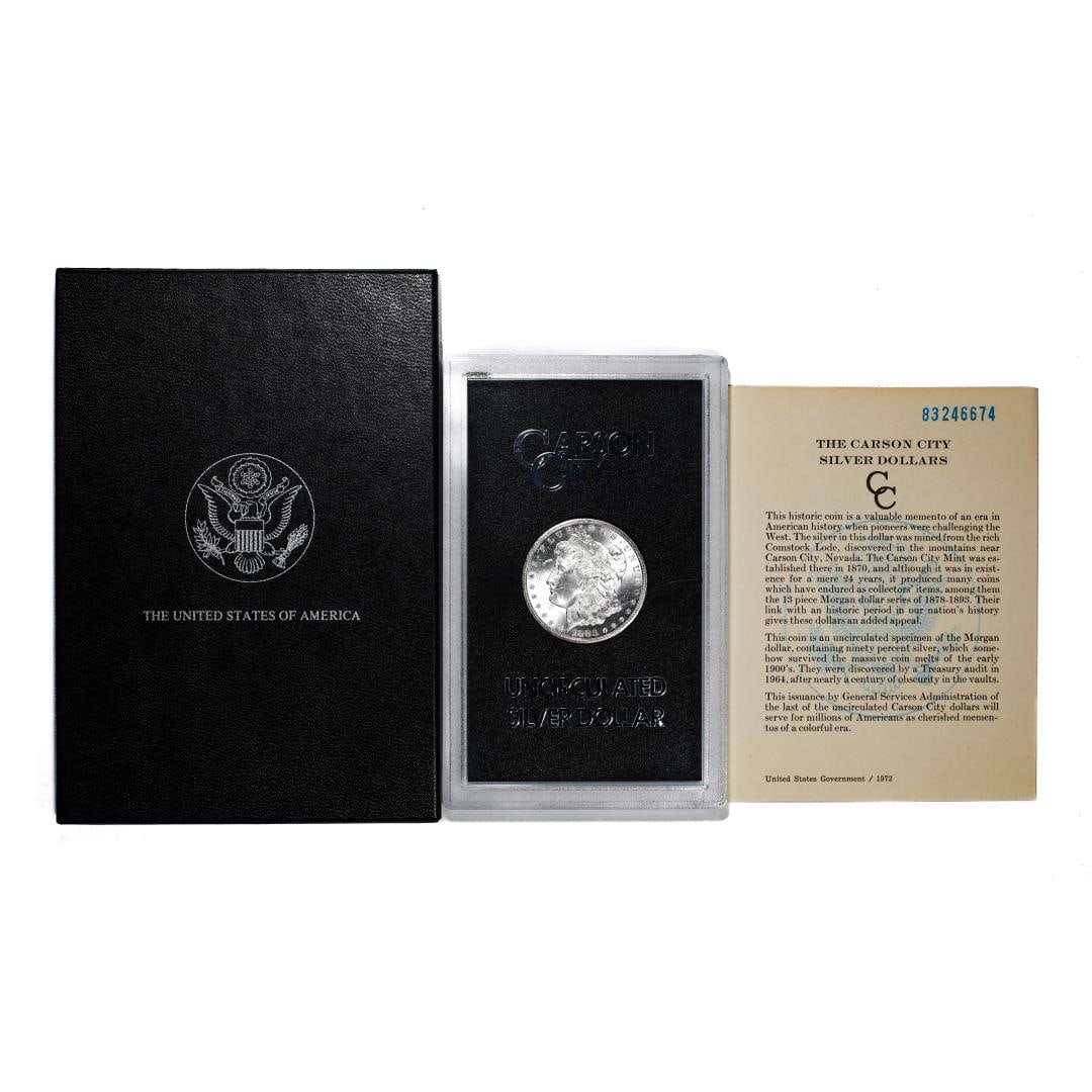 004: 1883-CC $1 Morgan Silver Dollar Coin GSA Hoard Uncirculated w/Box & COA: One 1883-CC $1 Morgan Silver Dollar Coin GSA Hoard Uncirculated w/Box & COA.