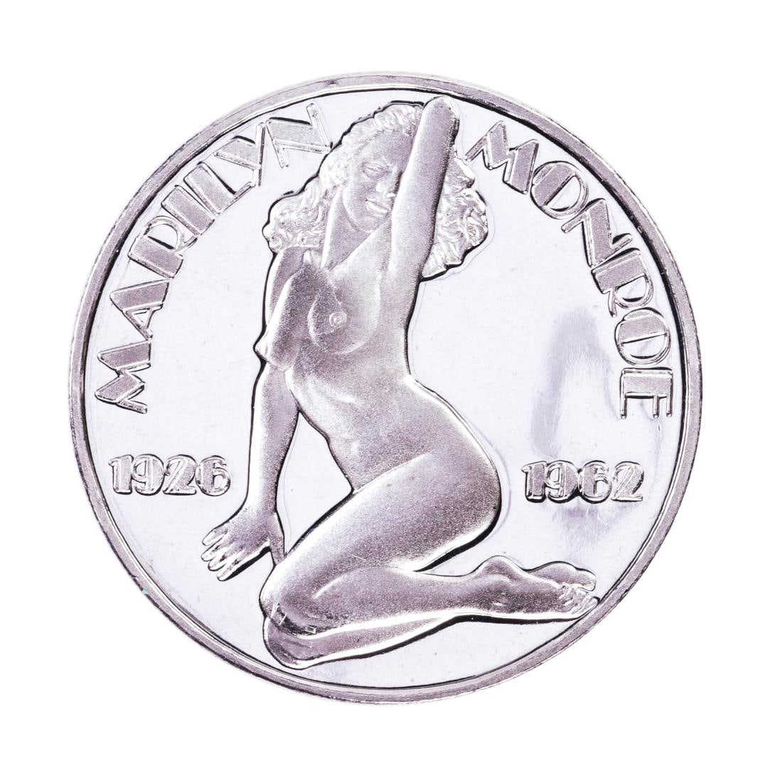 035: 1926-1962 Marilyn Monroe Proof 1oz .999 Fine Silver Round: One 1926-1962 Marilyn Monroe Proof 1oz .999 Fine Silver Round.