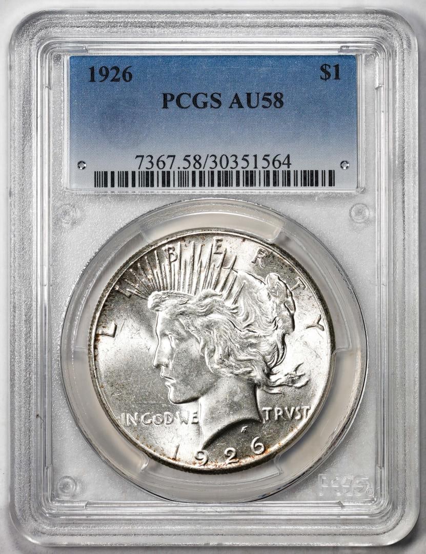 547) 1926 $1 Peace Silver Dollar Coin PCGS AU58: One 1926 $1 Peace Silver Dollar Coin PCGS AU58. PCGS Graded.