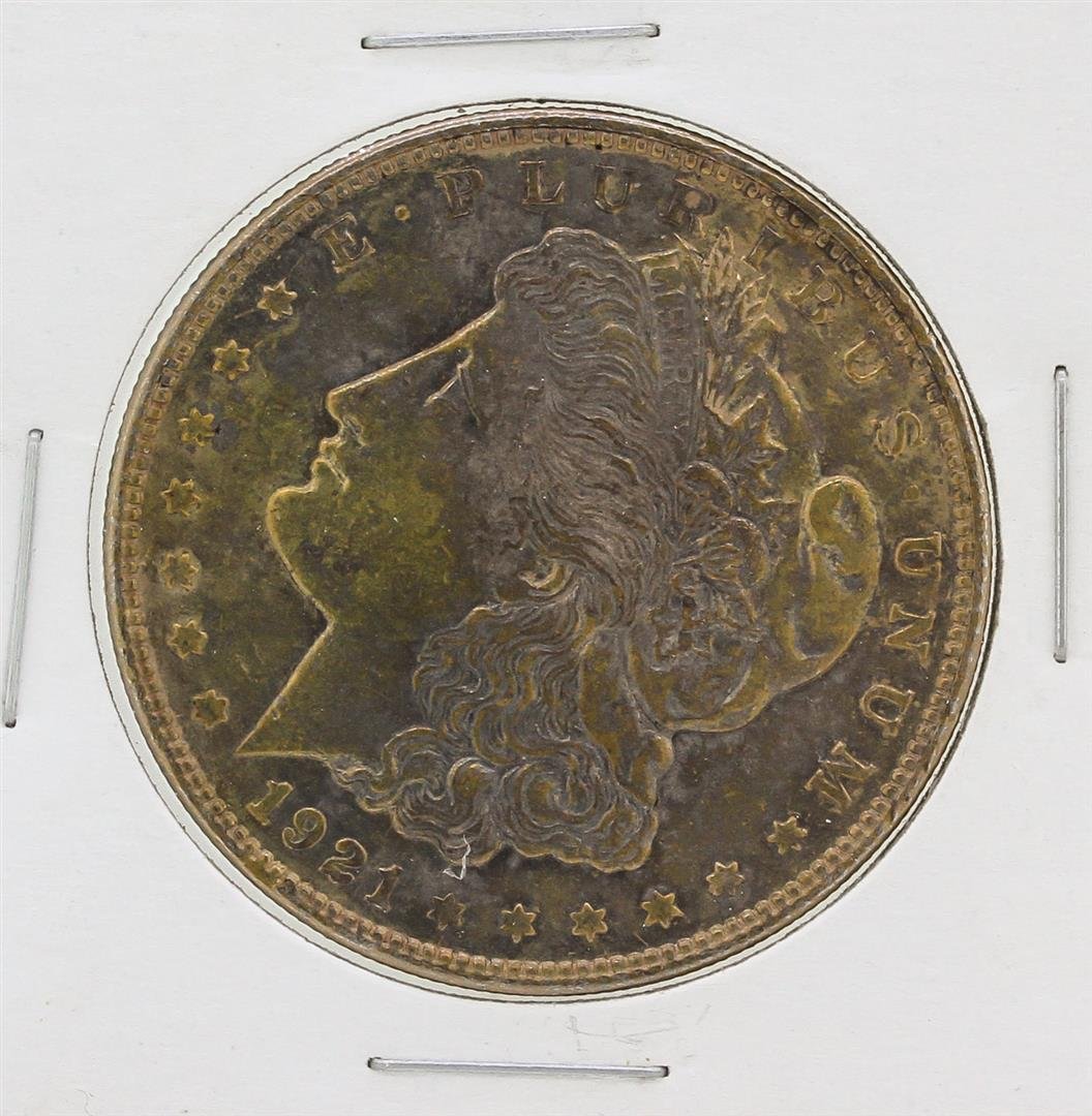 1921 Morgan Silver Dollar: One 1921 Morgan Silver Dollar.