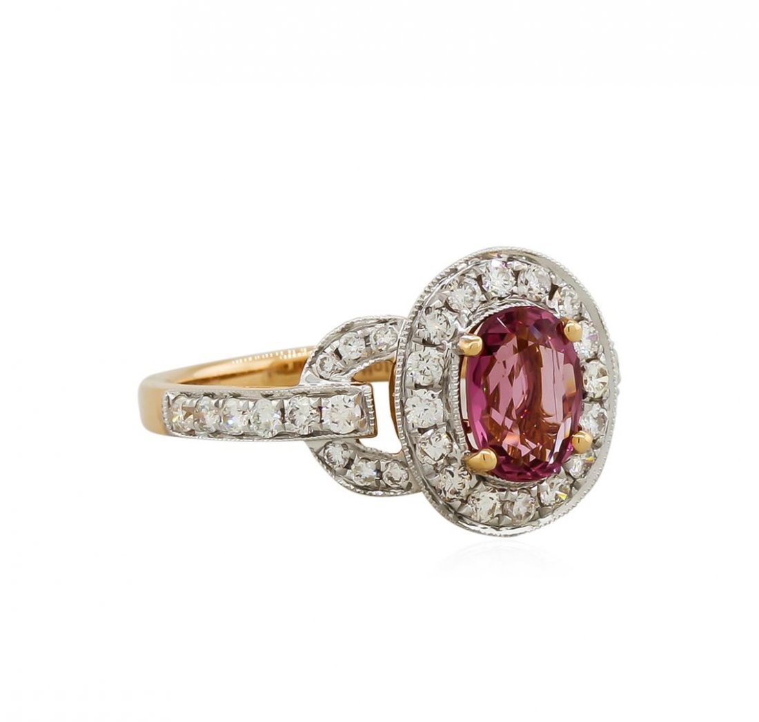 18KT Rose Gold 1.28ct Spinel and Diamond Ring: One spinel and diamond ring featuring 3.50grams 18KT Rose Gold and a 1.28 carat spinel center-stone surrounded by forty round diamonds totaling 0.63 carats.