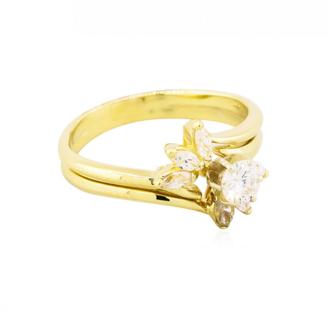 14KT Yellow Gold 0.60ctw Diamond Ring: One set electronically tested 14KT yellow gold lady's combination cast & assembled wedding ring soldered to wedding band with a bright polish finish. The featured lady's ring has a double shank measur