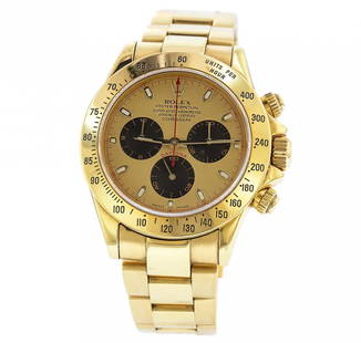 18KT Yellow Gold Rolex Daytona Paul Newman Chronograph: Gent's 18K Yellow Gold Rolex Daytona Cosmograph # 116528. Champagne Paul Newman Dial with Baton Hour Markers, Black Chronograph Subdials. 18K Yellow Gold Oyster Flip lock Bracelet with new style Clasp