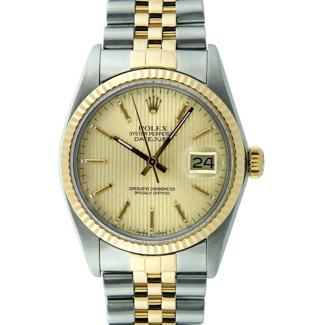 Rolex Mens Two Tone 14KT Yellow Gold Datejust: One Mens Two Tone Rolex Datejust Polished, Serviced & Electronically Tested, 14K Yellow Gold & Stainless Steel Case: 36mm, 14K Yellow Gold Crown, Bezel: 14K Yellow Gold Fluted Bezel. Custom Crystal: A
