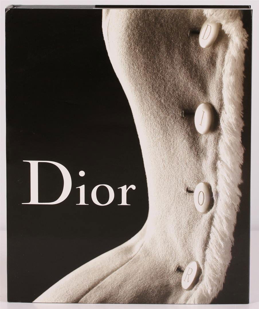 Christian Dior Large Coffee Table Book: Christian Dior: 60 year anniversary hardcover coffee table book. This oversized fashion book features original photography and insightful text which illuminate the House of Dior, including 150 of its
