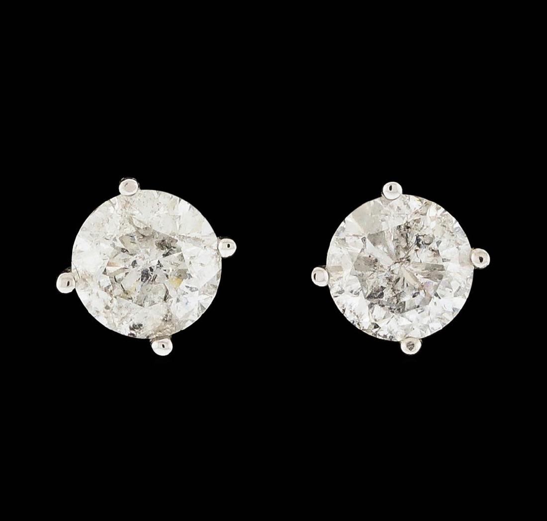 14KT White Gold 1.92ctw Diamond Earrings: One pair electronically tested 14KT white gold cast & assembled diamond solitaire earrings with screw backs. Bright polish finish. Condition is new, good workmanship. Containing: One prong set round b