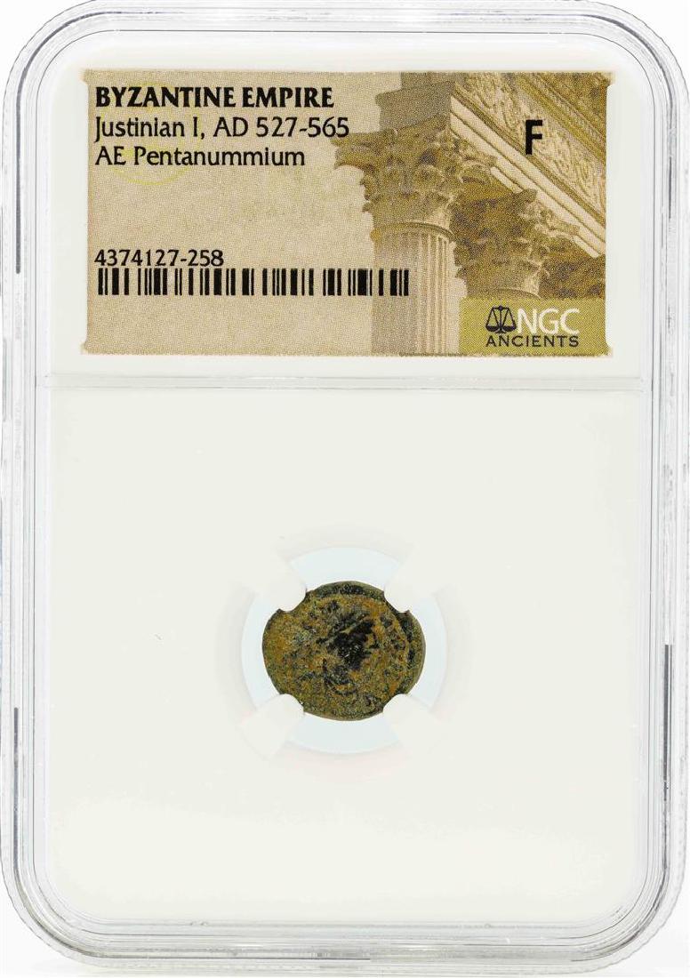 527-565 AD Byzantine Empire Justinian I, AE: One 527-565 AD Byzantine Empire Justinian I, AE Pentanummium Coin NGC Fine. NGC Certified.