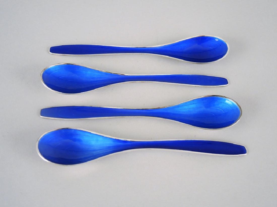 SET OF TOSTROP STERLING SILVER & ENAMEL SPOONS: 20th century. Jacob Torstrop, Oslo. Norwegian. L of each: 6 in. (15.25 cm.) Total weight: 111.04 g (3.92 oz)