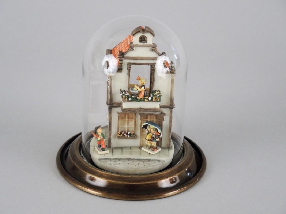 MINIATURE GOEBEL BAKERY DAY BUILDING WITH FIGURES: Late 20th century. All under a glass dome, USA & Taiwan.