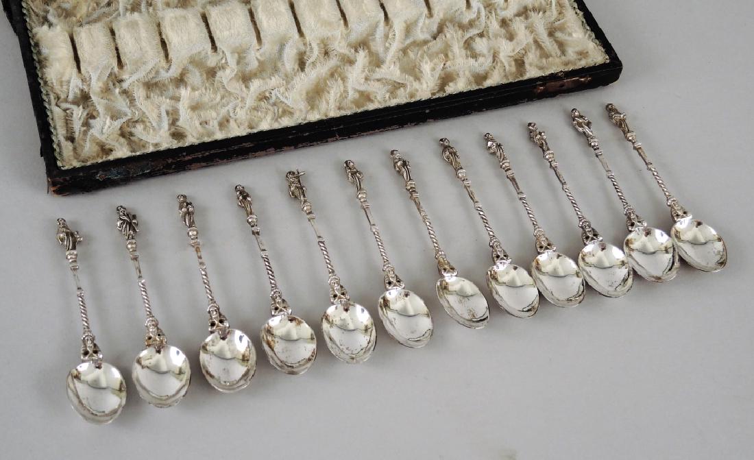 CASED SET OF TWELVE DUTCH SILVER APOSTLE SPOONS (1 of 5)