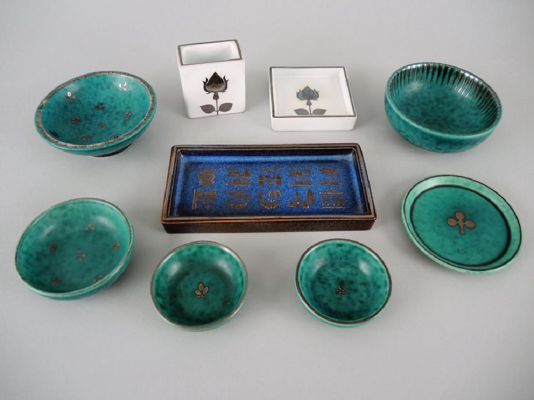 COLLECTION OF ARGENTA ART POTTERY: 20th century, with silver overlay design. Gustavsberg, Sweden.