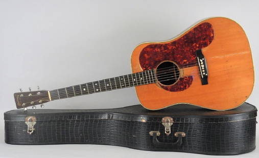 1952 C.F. D-28 MARTIN & COMPANY ACOUSTIC GUITAR: Spruce top, Brazilian rosewood back & sides and ebony fringe board & bridge. Numbered 126852. Serial number stamped on September 22, 1952. Stamped Made in USA on reverse. Overall wear. Cracking under