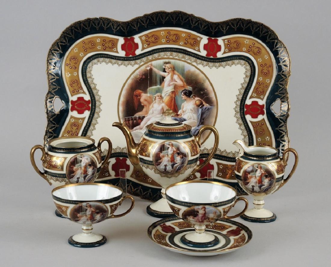 ROYAL VIENNA PORCELAIN CABARET COFFEE SERVICE: Late 19th/early 20th century. Moritz Zdekauer, Austria. Signed Undine. L of tray: 15 1/2 in (39.25 cm.) H of coffee pot: 6 1/4 in. (15.75 cm.)