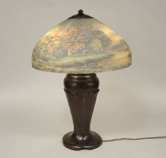 HANDEL LAMP: Early 20th century, leaf molded patinated metal base, with 3 socket light cluster, reverse painted shade - signed Handel 6644 shade: 18" (45.72cm.) h. lamp: 24 1/2" (62.23cm.)