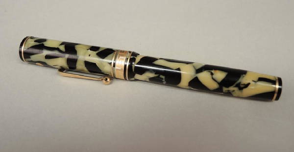 WAHL EVERSHARP OVERSIZED FOUNTAIN PEN: C. 1930, Gold Seal black pearl body, Flexible 14 k gold medium nib, with Greek Key banding l. 5 3.8" (13.65cm.) minor separation on lower body, needs refurbishing