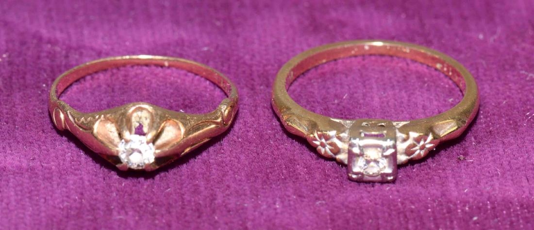 (2) 14k GOLD AND DIAMOND RINGS - Both set with (1): (2) 14k GOLD AND DIAMOND RINGS - Both set with (1) round cut diamond approx weight .05 and .10pts each; Overall totel weight 1.9dwt - Condition: Age appropriate wear; All items sold as is.