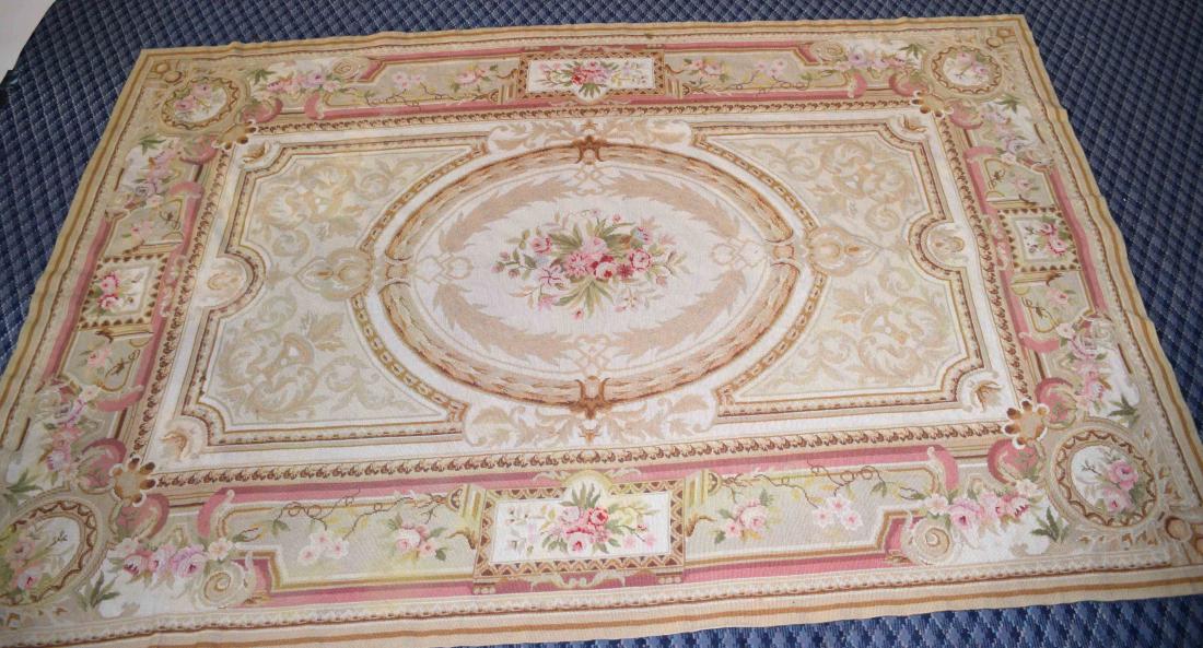AUBUSSON CARPET, floral cartouche, 8'4'' x 5'7'' W.: AUBUSSON CARPET, floral cartouche, 8'4'' x 5'7'' W. Condition: Age appropriate wear; All items sold as is.