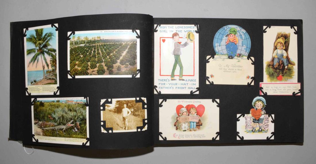 SCRAPBOOK OF PHOTOS, CARDS AND POSTCARDS. Circa 1920s. (1 of 4)