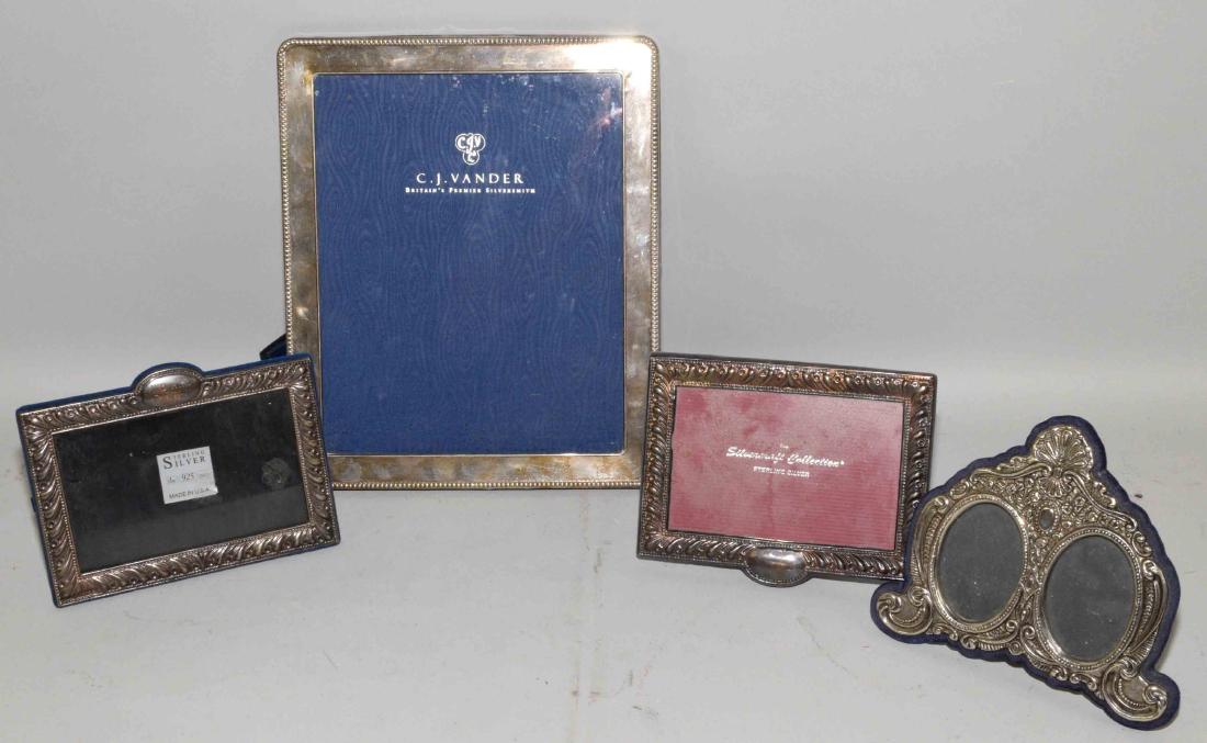 A GROUP OF (4) STERLING SILVER PICTURE FRAMES, largest (1 of 4)