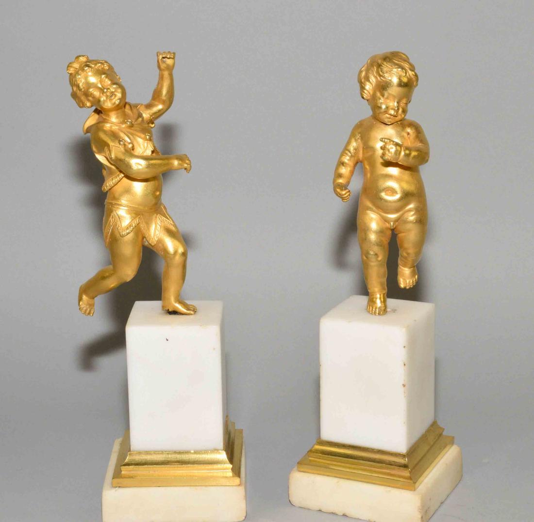 PAIR OF GILT BRONZE FIGURES OF PUTTI, late 19th C. on a (1 of 6)