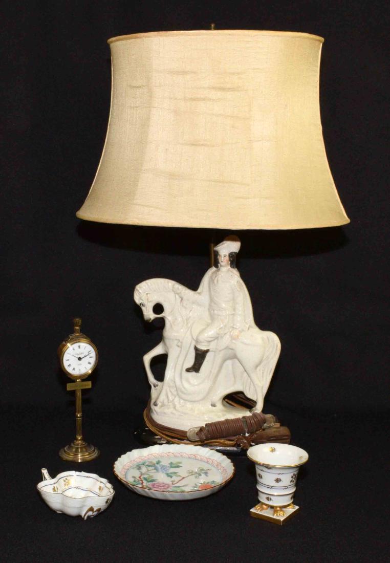 (5 PC.) GROUP OF DECORATIVE OBJECTS. Comprising:: (5 PC.) GROUP OF DECORATIVE OBJECTS. Comprising: Staffordshire figure mounted as a lamp. (3) small porcelain articles (one glued, plate chipped). Swiza Sheffield street post clock, 8''H. Provenance: M