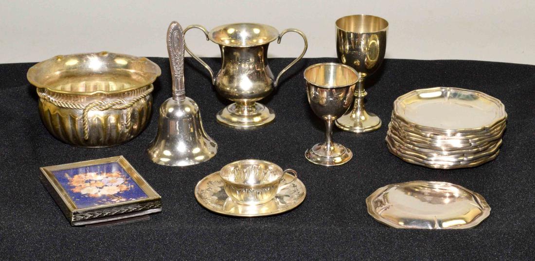GROUP OF (19) SILVERPLATE, PEWTER AND BRASS DECORATIVE: GROUP OF (19) SILVERPLATE, PEWTER AND BRASS DECORATIVE OBJECTS in miniature sizes. Comprising: Silverplate - tea cup & saucer, goblet, (2) trophies, bell & frame. Pewter - set of (12) trays marked G.