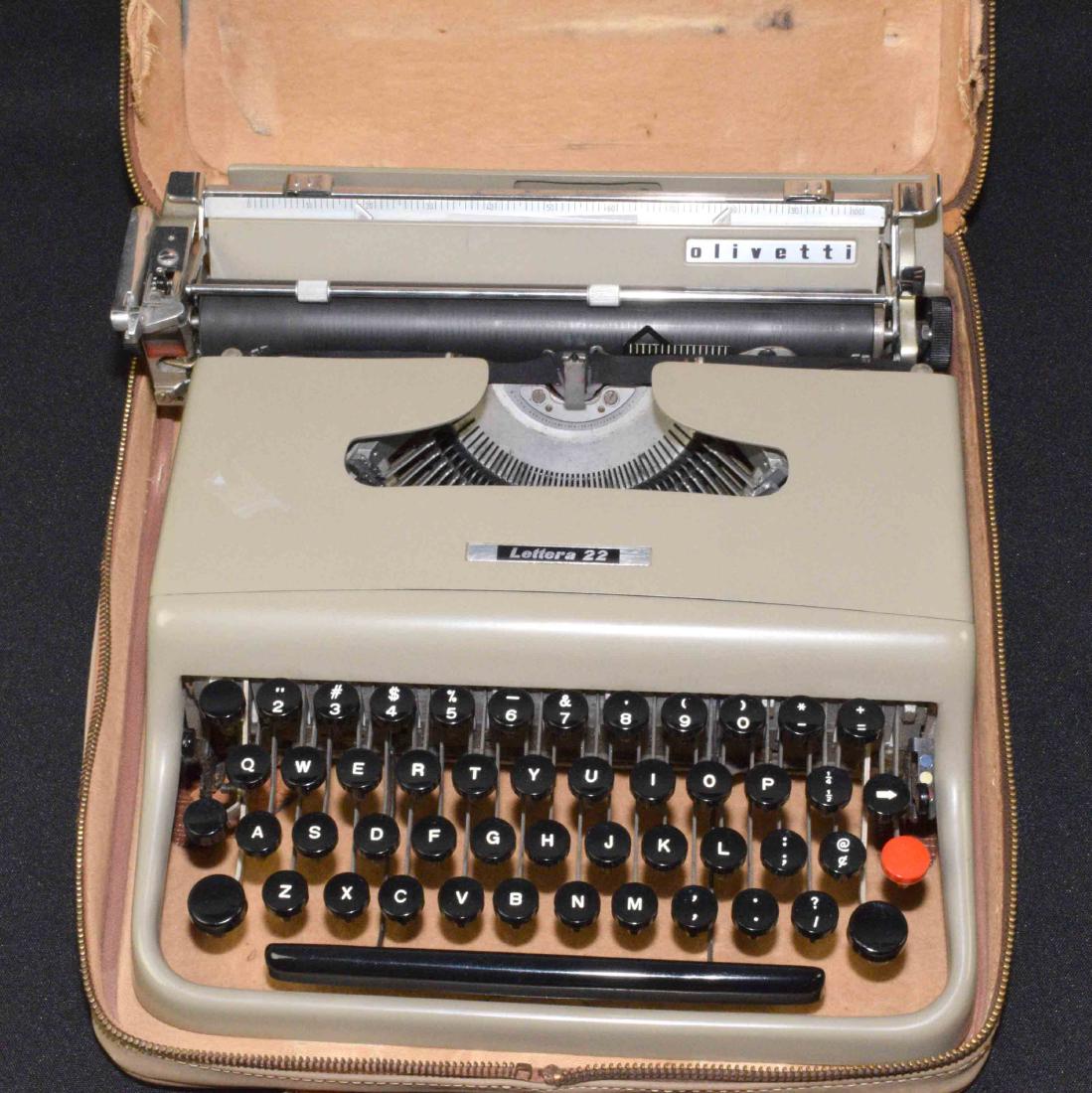 TRAVEL TYPEWRITER by Olivetti in case. 12''W x 13''D. (1 of 2)