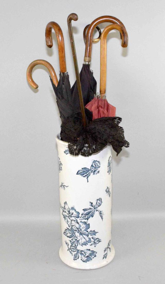 ANTIQUE CYLINDRICAL PORCELAIN UMBRELLA STAND WITH