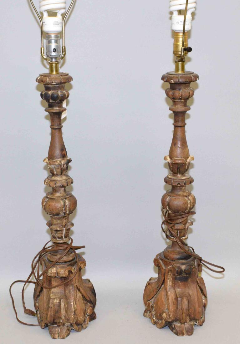 PAIR OF HAND CARVED WOODEN LAMPS. (1 of 1)