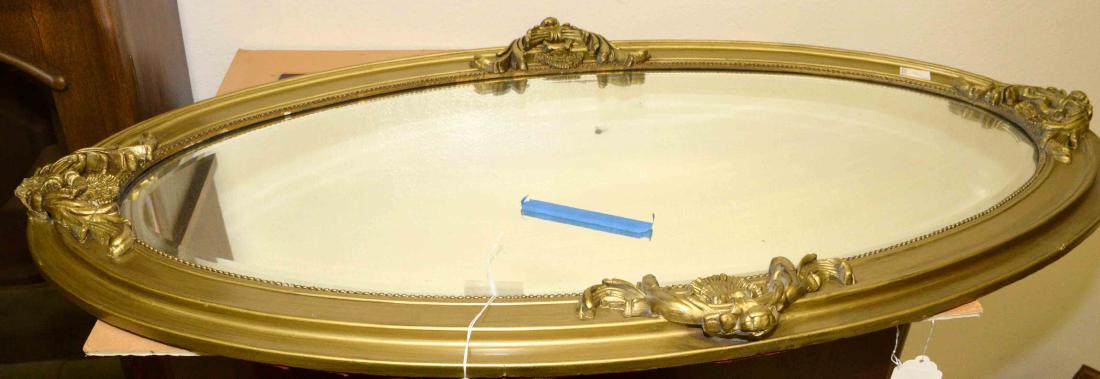 GOLD FRAMED OVAL MIRROR. 24''h x 46''l. (1 of 1)