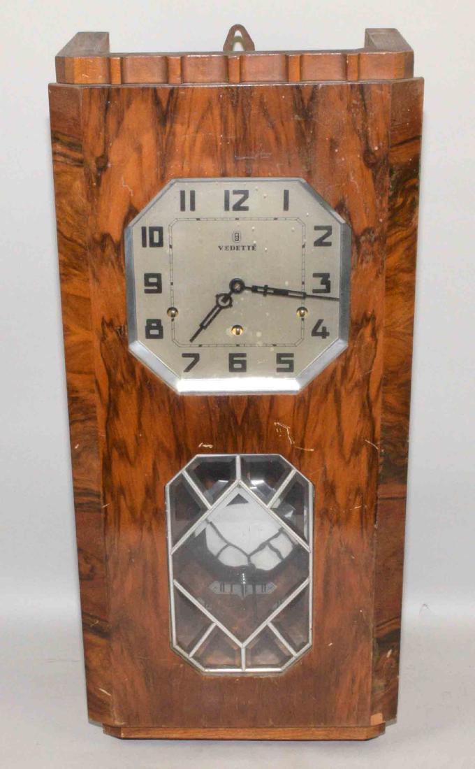 VEDETTE ART DECO REGULATOR CLOCK. 27''H x 12.5''W x: VEDETTE ART DECO REGULATOR CLOCK. 27''H x 12.5''W x 6.5''D.