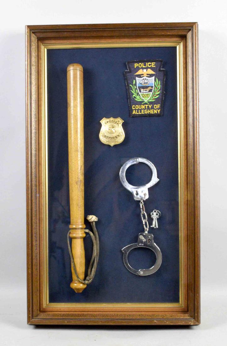 POLICE MEMORABILIA COLLECTION, Allegheny County, cased: POLICE MEMORABILIA COLLECTION, Allegheny County, cased under glass. 26.5''H x 15''W.
