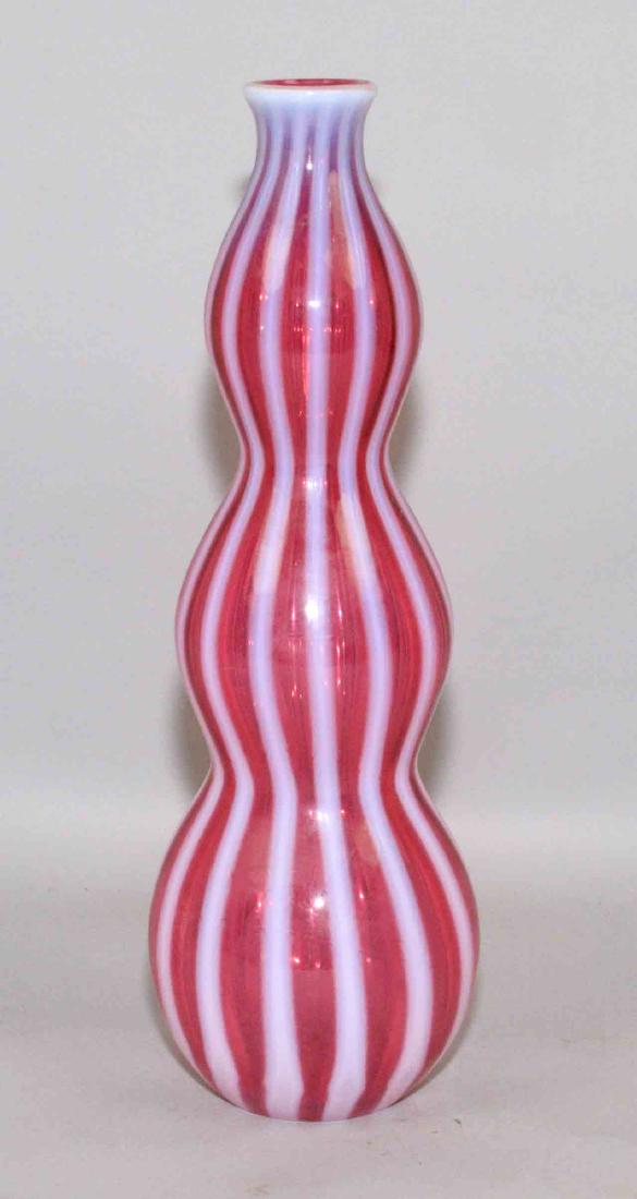 FENTON CIRCA 1953 NEW WORLD RIB OPTIC CRANBERRY: FENTON CIRCA 1953 NEW WORLD RIB OPTIC CRANBERRY OPALESCENT WINE BOTTLE. Missing stopper. 12''H.