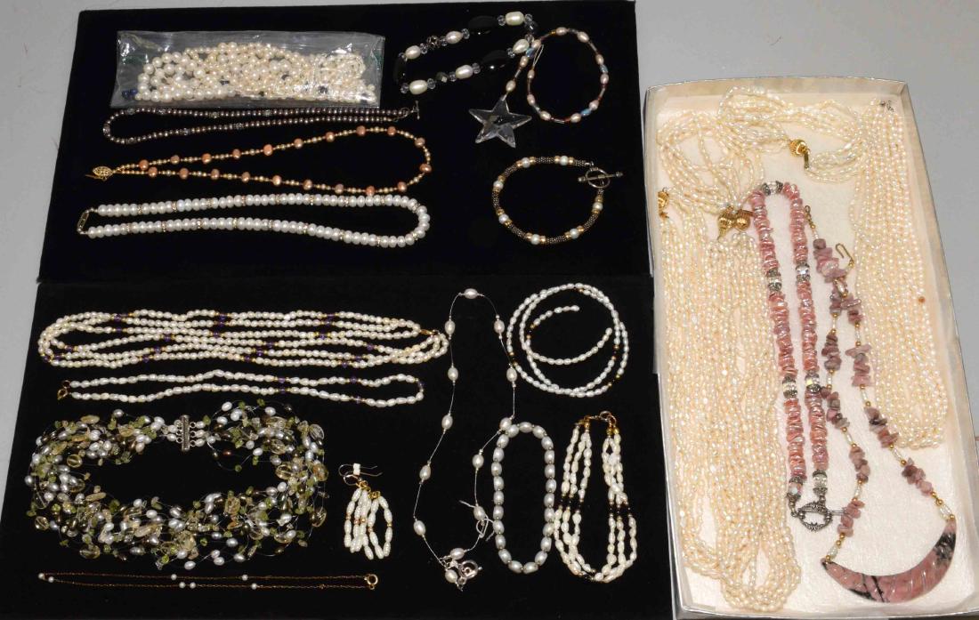 LOT OF (20+) ASST. FRESHWATER PEARL AND SEMI PRECIOUS: LOT OF (20+) ASST. FRESHWATER PEARL AND SEMI PRECIOUS STONE JEWELRY. Beads include: pearl, amythest, peridot, onyx, crystal and more with necklaces, bracelets and earrings.