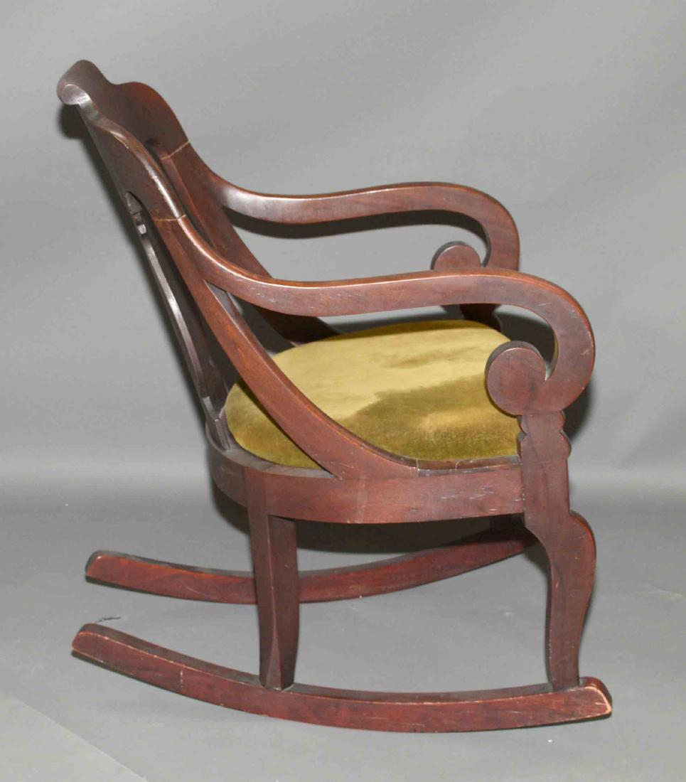 FIDDLEBACK CHILD'S ROCKER with velvet seat cover.: FIDDLEBACK CHILD'S ROCKER with velvet seat cover. Condition: fair, darkened original finish. 31''H x 20.50''W x 25''D.