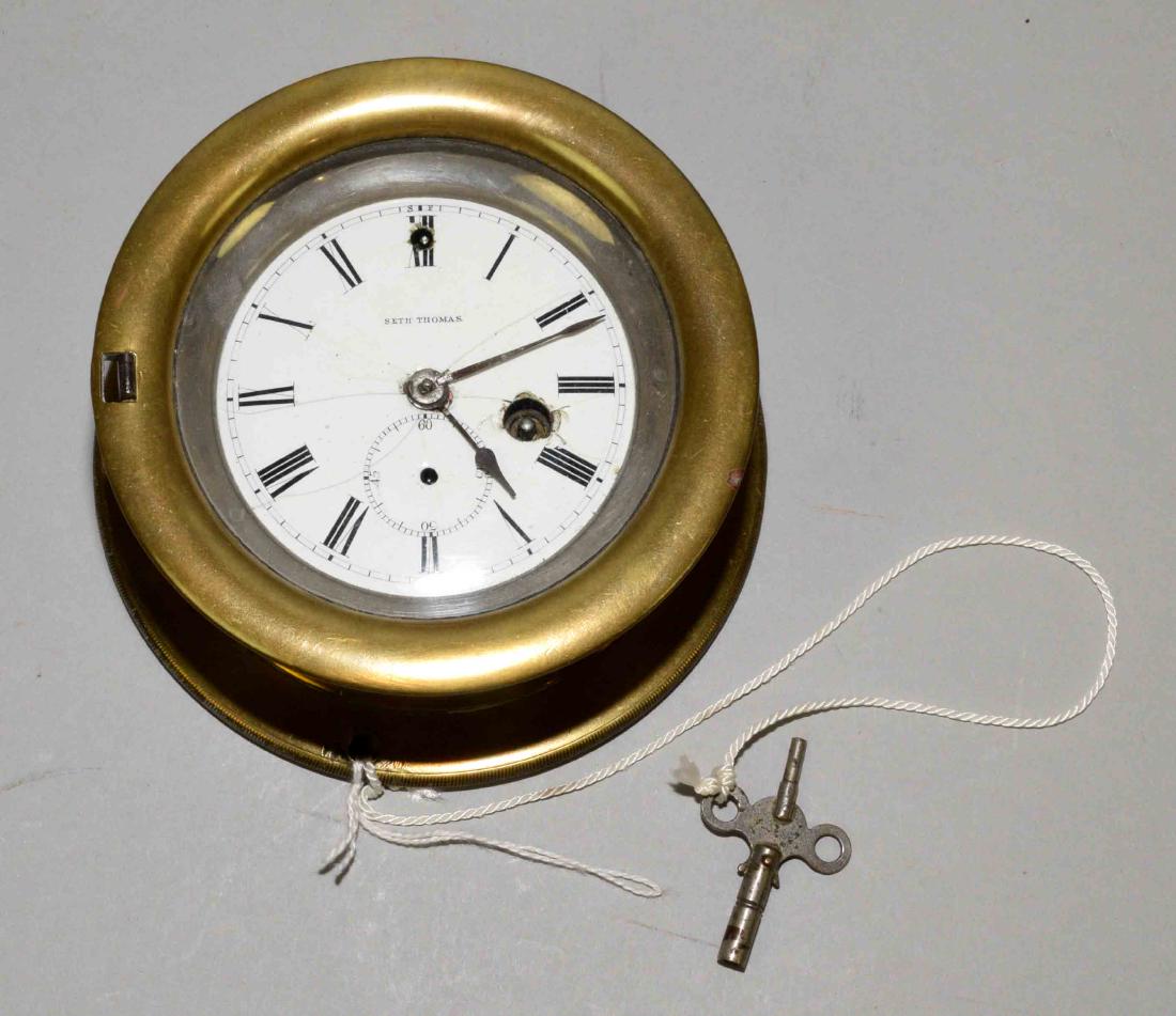 SETH THOMAS BRASS SHIP'S CLOCK with porcelain dial. (1 of 4)