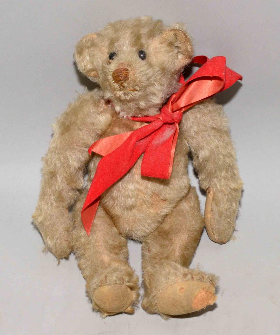 VINTAGE TEDDY BEAR w/red ribbon and movable head, arms (1 of 2)