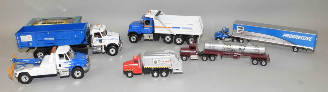 COLLECTION OF ASST. TOY TRUCKS. Largest 12''L. (1 of 8)
