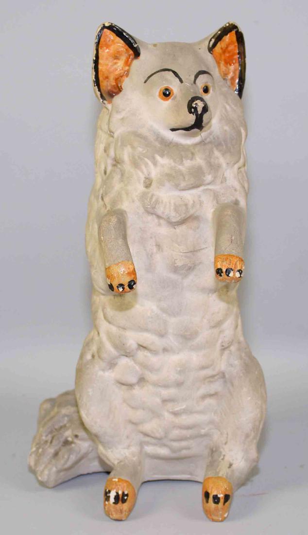 ANTIQUE POTTERY PAINTED WOLF OR DOG BANK. 11.5''H x: ANTIQUE POTTERY PAINTED WOLF OR DOG BANK. 11.5''H x 6.5''W.