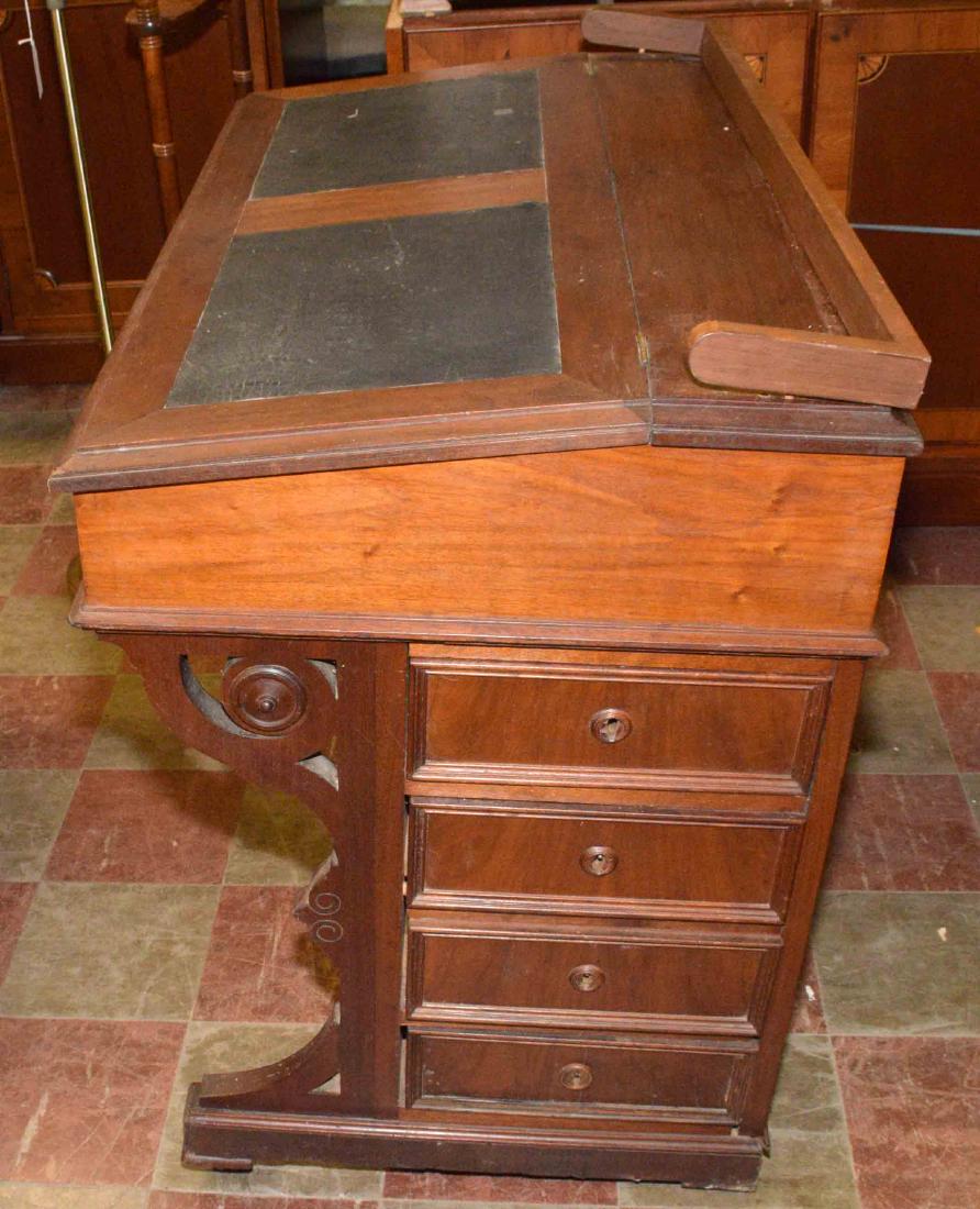 MID 19TH C. ENGLISH CAPTAINS DESK. With fitted interior: MID 19TH C. ENGLISH CAPTAINS DESK. With fitted interior and key. 34''H x 37''L x 23''W.