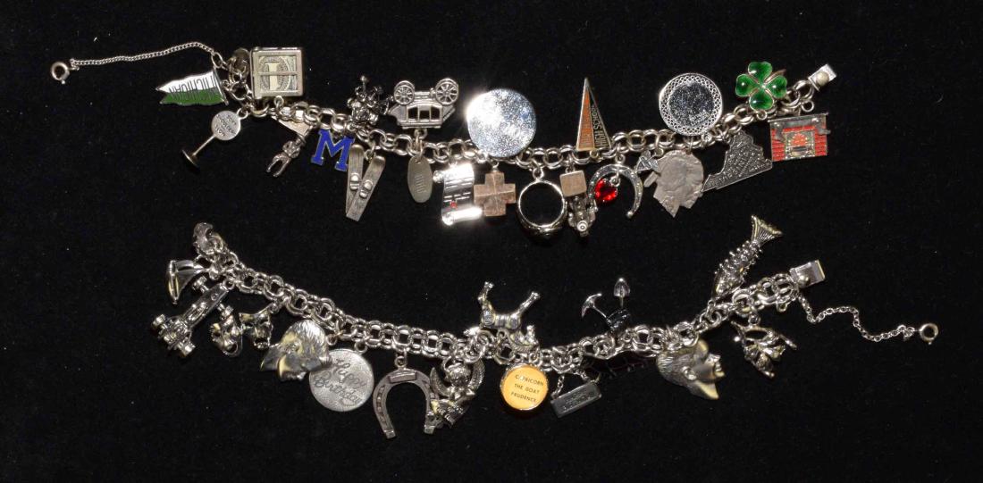 (2) ASST. VINTAGE WELLS AND DANECRAFT STERLING DOUBLE: (2) ASST. VINTAGE WELLS AND DANECRAFT STERLING DOUBLE LOOP CHARM BRACELETS. With (37) charms - (26) in sterling. Total weight 3.3 ozt.