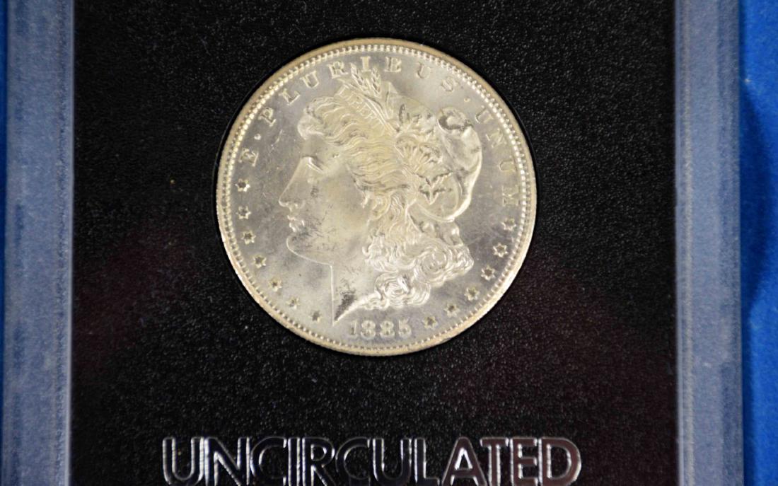 1885-CC $1 morgan silver dollar coin GSA uncirculated (1 of 3)