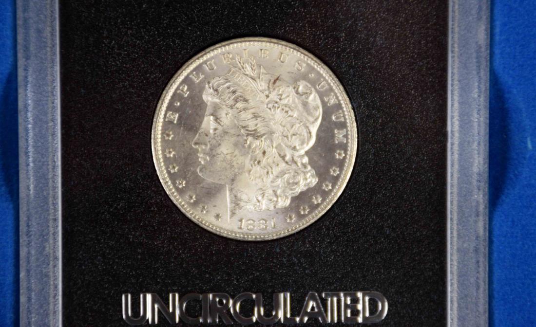1881-CC $1 morgan silver dollar coin uncirculated GSA (1 of 3)